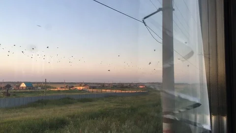 View from the window of the train to the village in summer 動画素材 94329929