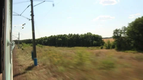  View from the window of a traveling train to the forest Stock Footage 158166504