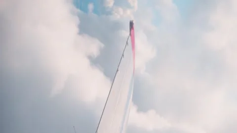 View from window vertical video airplane wing blue sky stunning sight Airplane Video stock 263060359