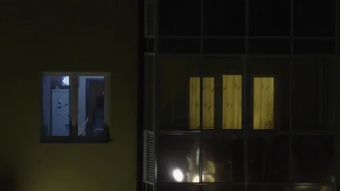 The view of the window where the man working behind the notebook. Young man Stock Footage 85029055