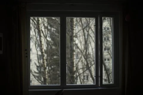 The view from the window. Window in the apartment. Interior details. Stock Photos