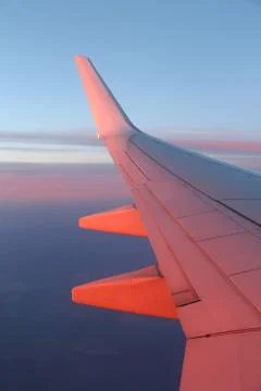 View from window on wing of plane Stock Photos