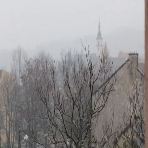 View from the window.It's snowing, Tower City Hall. Winter. Video stock 69467682