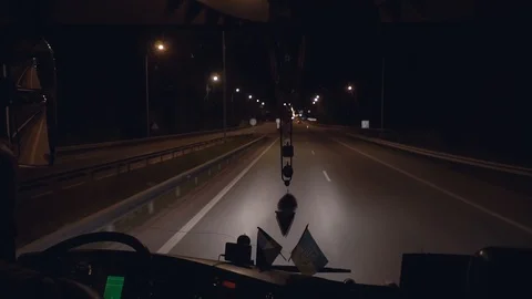 View from the windshield of the bus on the road in night Ukraine Stock Footage 99009429