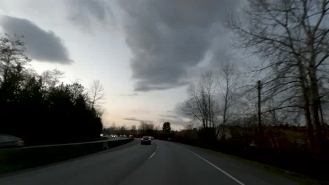 View from the windshield of a car that is driving along the highway Stock Footage 137931536