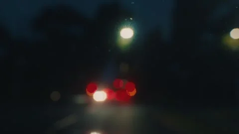 View from the Windshield of a Car on a Night Road with Car Lights in Blur. Stock Footage 248838223