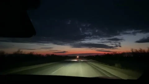 The view from the windshield of the car to the sunset 動画素材 230027850