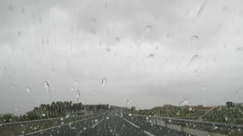 View from the windshield during the rain, A31 highway, Spain , 02/05/2026 Stock Footage 344038699