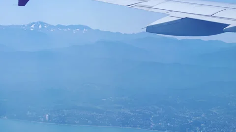 View of the wing of an aircraft taking off, accelerated shooting. Stock Footage 246877215