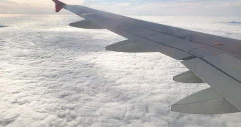 View of wing and engine airplane over thick layer of cloud. Stock Footage 117442540