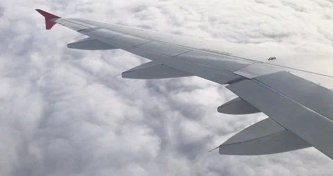 View of wing and engine airplane over thick layer of cloud. Stock Footage 117442705