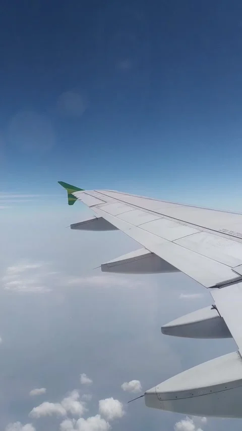 View of Wing Plane above the cloud Stock Footage 130383097