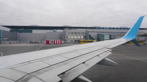 View of the wing of the Pobeda airline Stock Footage 219754368