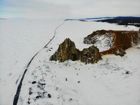 View of the winter cape Burkhan or Shamanka rock on the island Stock Photos