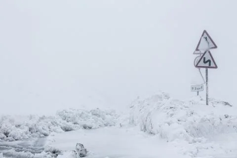 View on winter road during bad weather conditions Stock Photos