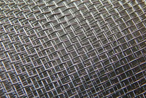 View of a wire mesh for use as a background Stock Photos