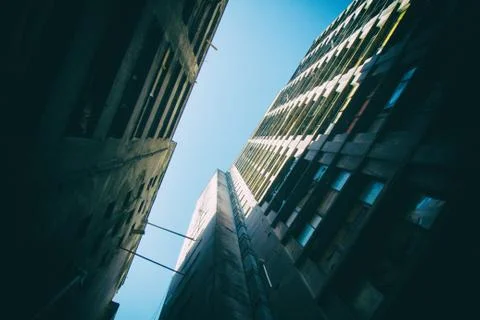 View from within a complex of dilapidated buildings. Stock Photos