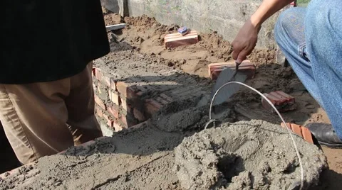 View of a  Worker building ditches. Stock Footage 58627510