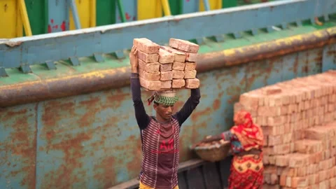 View of a worker carrying bricks at Aminbazar, Bangladesh. 스톡 동영상 334993773
