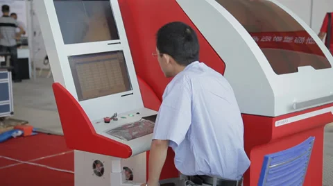 View of worker operating machine, xi'an, china Stock Footage 38010773