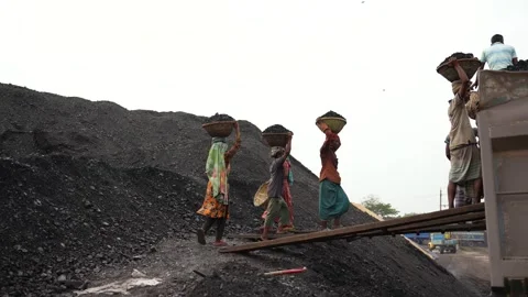 View of workers carrying coal baskets at Aminbazar, Bangladesh. Video stock 334995578