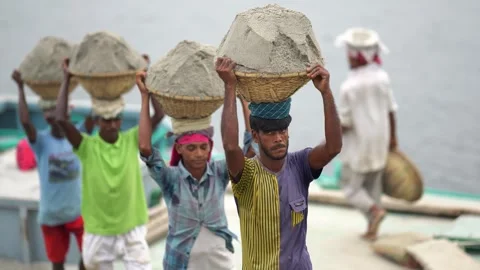 View of workers carrying sand baskets in Aminbazar, Bangladesh. Stock Footage 334993508