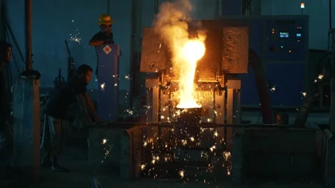 View of workers processing molten metal in a foundry, Bangladesh. Stock Footage 334951993