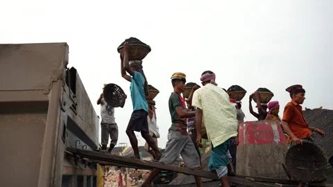 View of workers unloading coal at Aminbazar, Bangladesh. Stock Footage 334995651