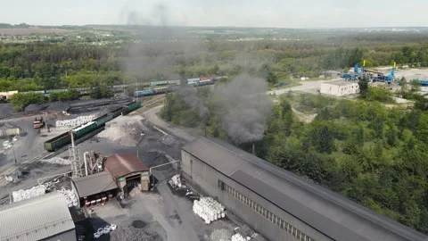 A view of a working factory from a drone with a black house overlooking 스톡 동영상 155847987