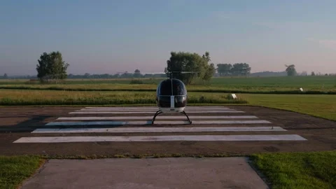 View of working helicopter at runway strip Stock Footage 130486471
