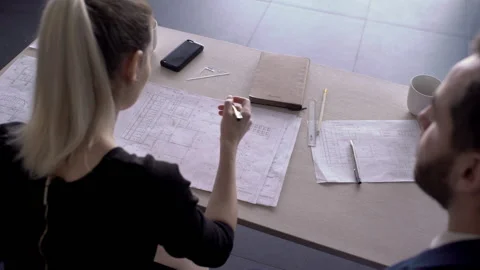 View of working table for which engineers with drawings work. Stock Footage 85628580