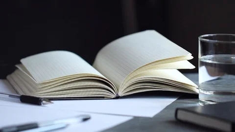 View of the workplace. Open notebook over table. Stock Footage 88134738