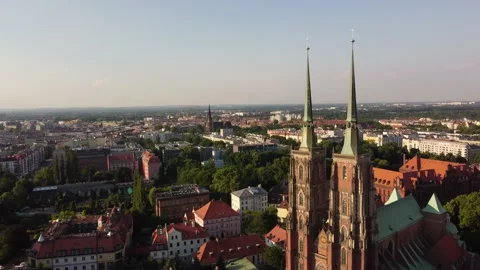View of Wrocław from drone passing next to the cathedral towers Ostrów Tumski Stock Footage 201865493