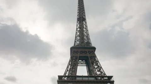 View of the wrought-iron lattice Eiffel Tower from the Pont d'Iena bridge. Video stock 310178206