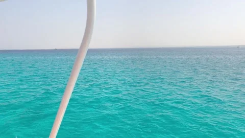 A view from yacht cutting through the blue sea. Freedom, movement, pure energy Stock Footage 333993451