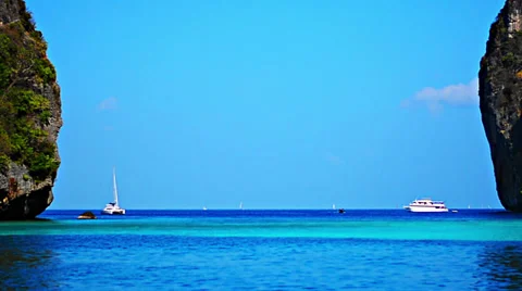 View of the  yachts between rocks in the tropical lagoon Video stock 37166995