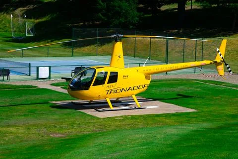View of a yellow helicopter Stock Photos