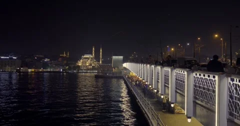 View of Yeni Mosque Camii in the background. Istanbul night view. Stock Footage 260810202