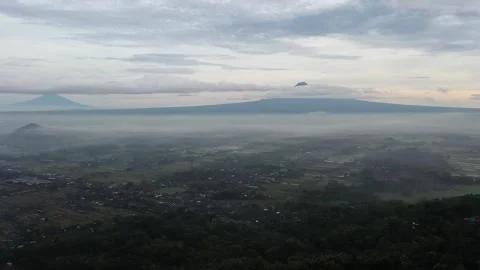 View of Yogyakarta with Merapi Mountain in the background Stock-Footage 235653895