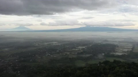 View of Yogyakarta with Merapi Mountain in the background Stock-Footage 235654249