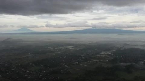 View of Yogyakarta with Merapi Mountain in the background Stock Footage 235654291