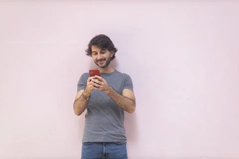 View of a young man with smartphone Stock Photos