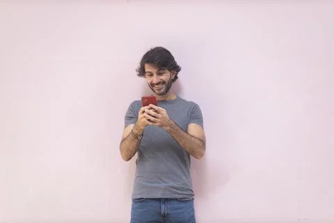 View of a young man with smartphone Stock Photos