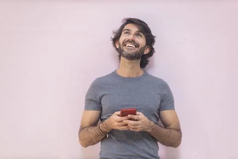 View of a young man with smartphone Stock Photos