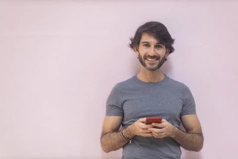 View of a young man with smartphone Stock Photos