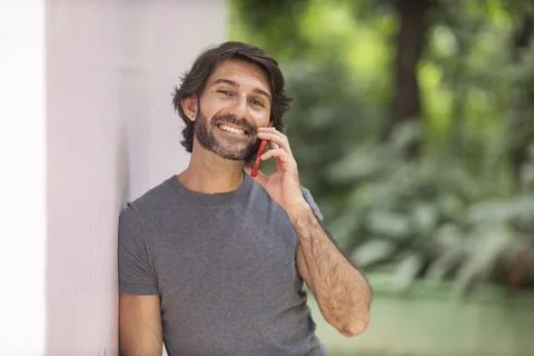 View of a young man with smartphone Stock Photos