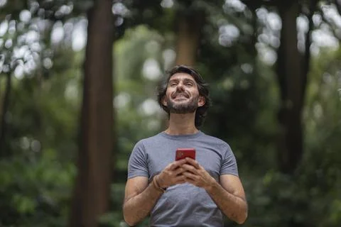 View of a young man with smartphone Stock Photos