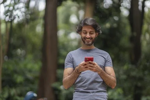 View of a young man with smartphone Stock Photos