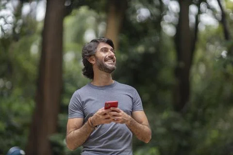 View of a young man with smartphone Stock Photos