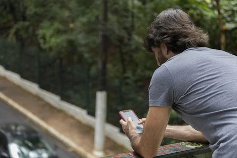 View of a young man with smartphone Stock Photos